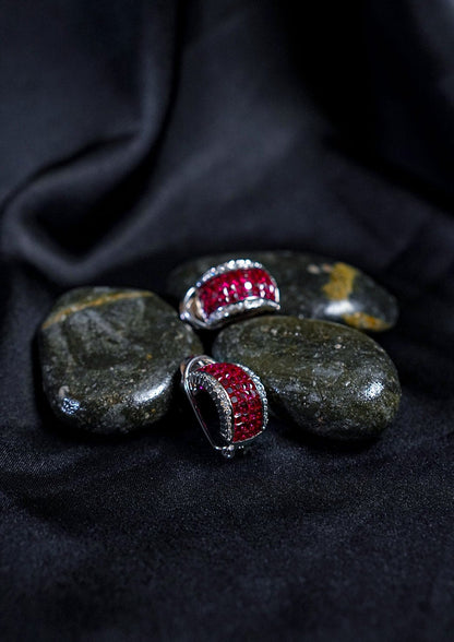 The Mystery Setting Ruby Hoops
