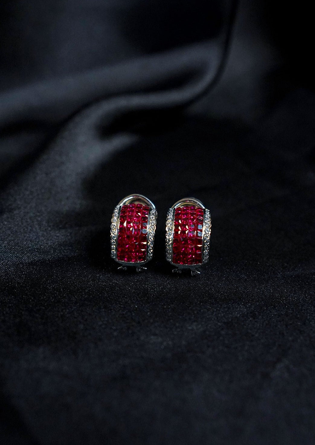 The Mystery Setting Ruby Hoops