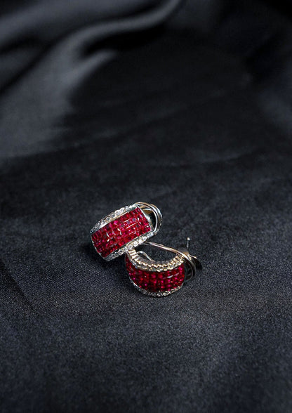 The Mystery Setting Ruby Hoops