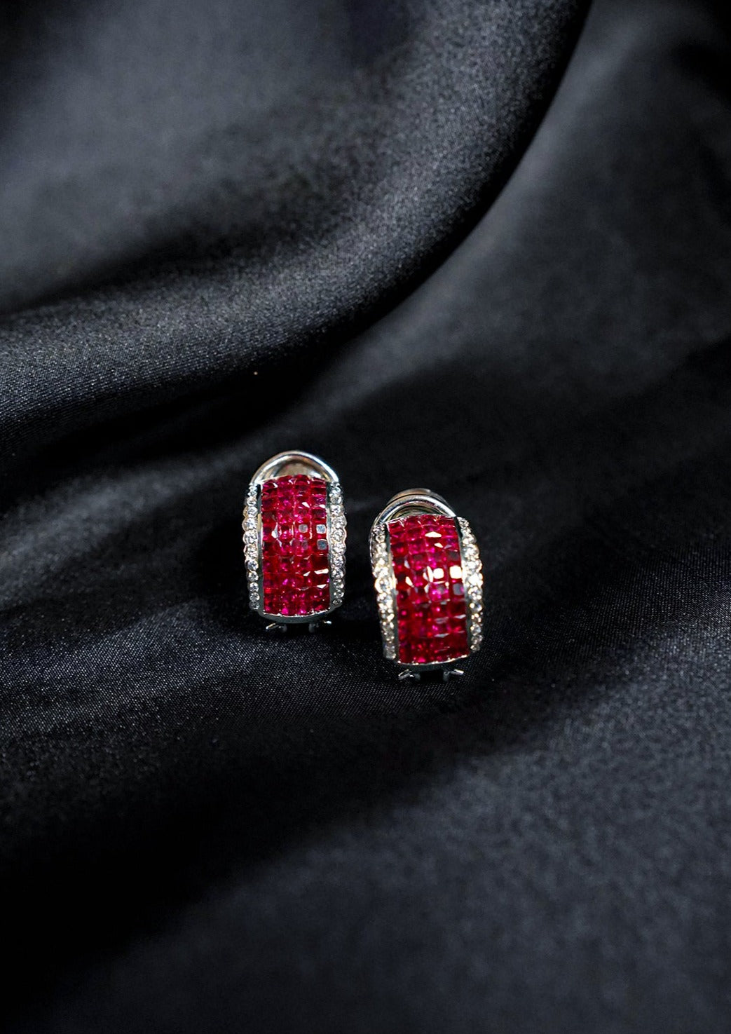 The Mystery Setting Ruby Hoops