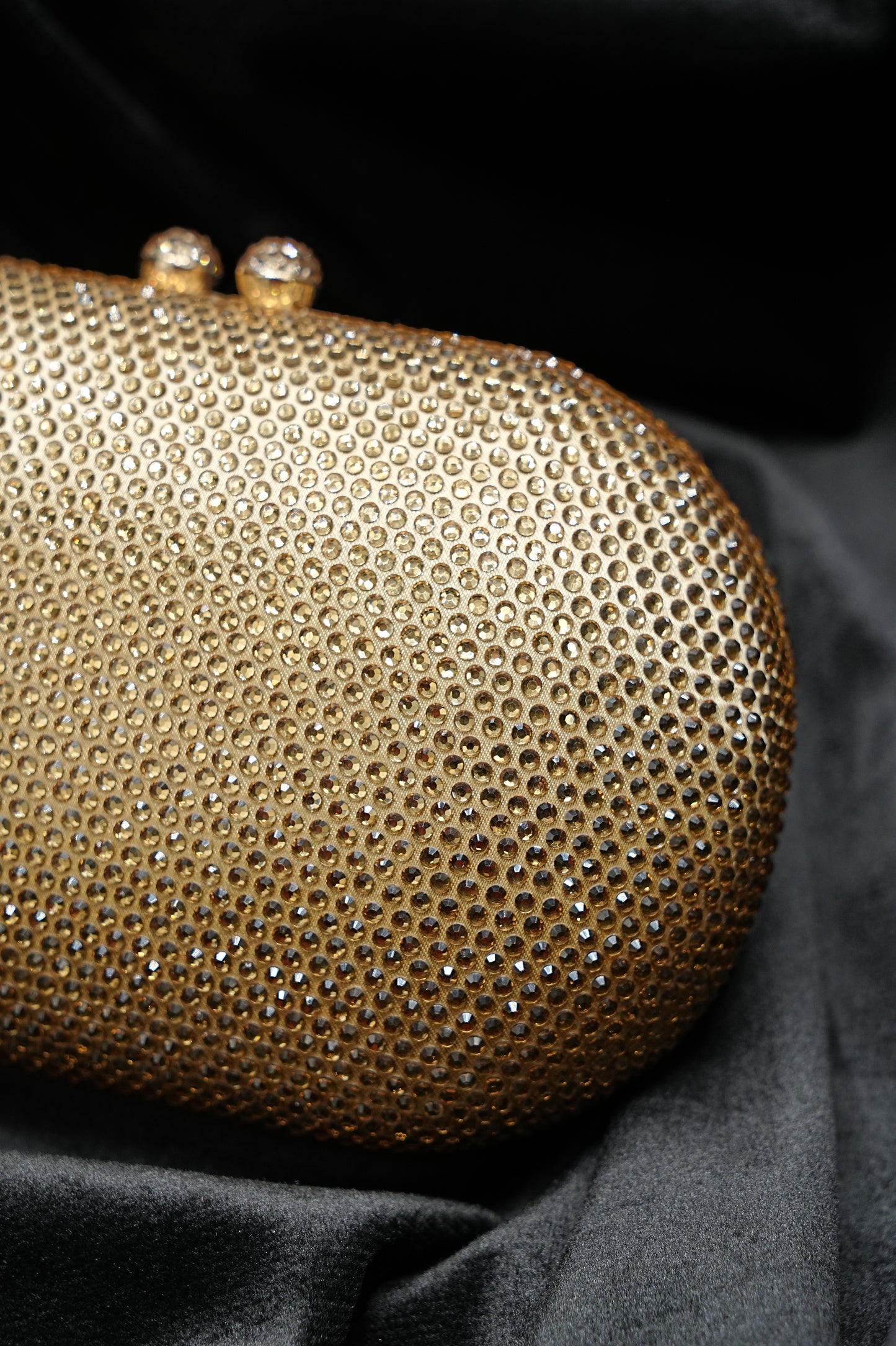 Sleek Rounded  Gold Clutch