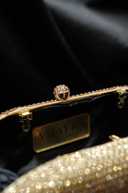 Sleek Rounded  Gold Clutch